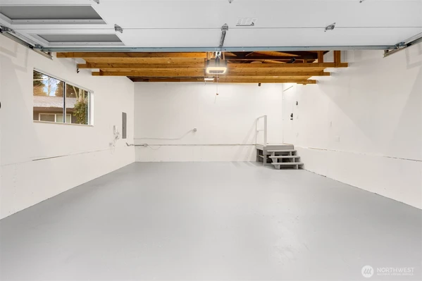 2 Car Garage: Brand new garage door. Freshly painted garage floor and walls.