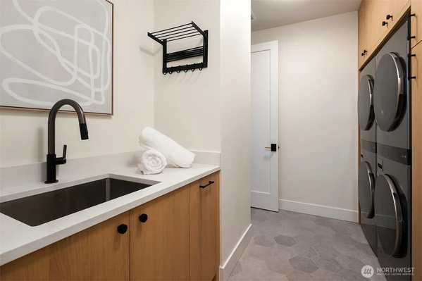 Laundry with Dual Columns (connected to the primary suite).